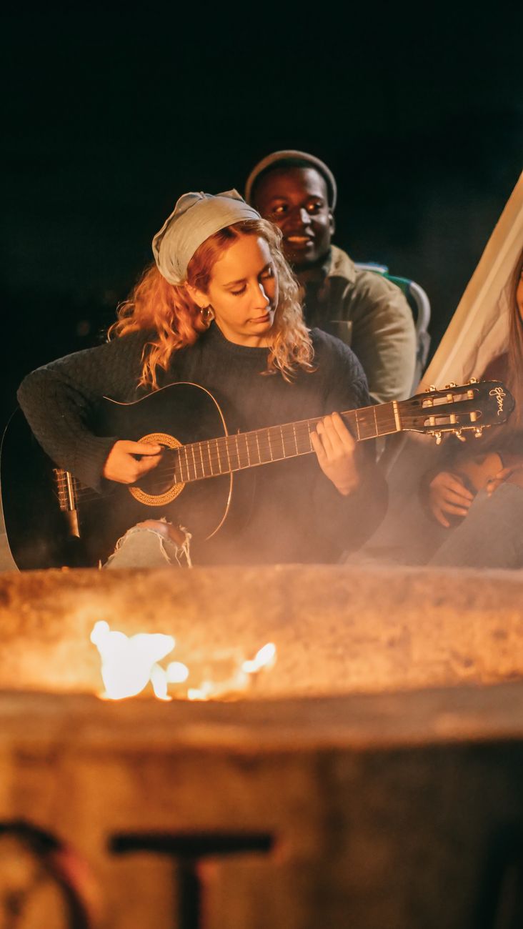 woman playing guitar
